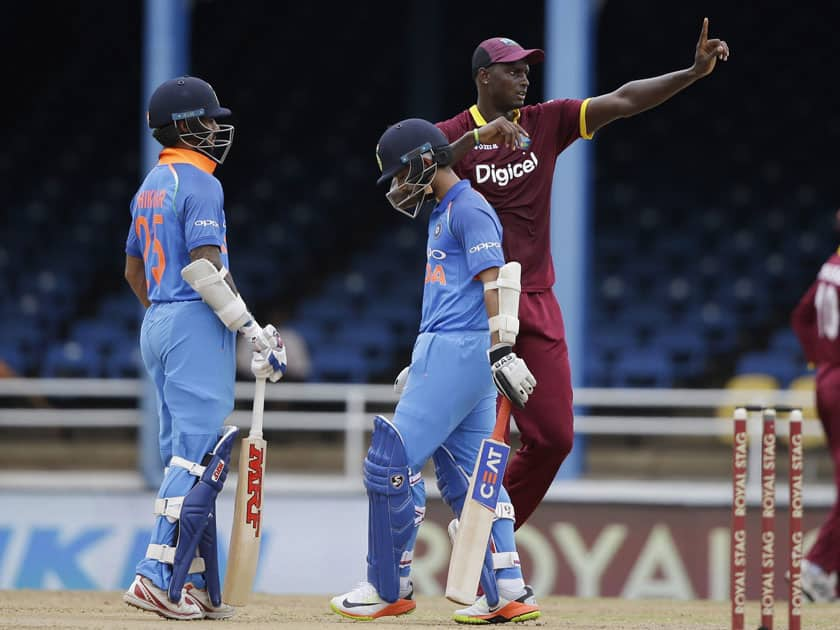 West Indies captain Jason Holder instructs his players