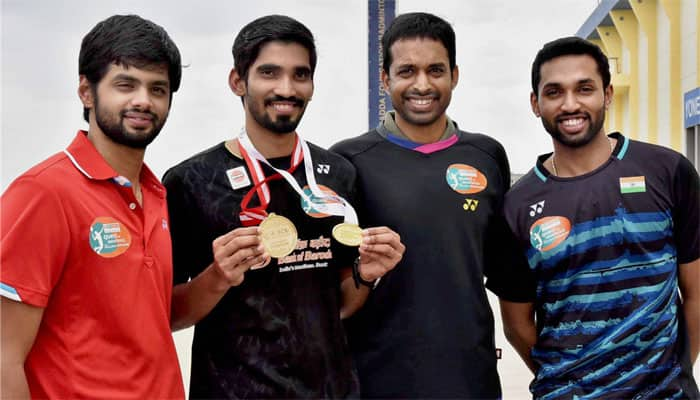 Telangana Governor felicitates shuttlers Kidambi Srikanth, H S Prannoy and B Sai Praneeth