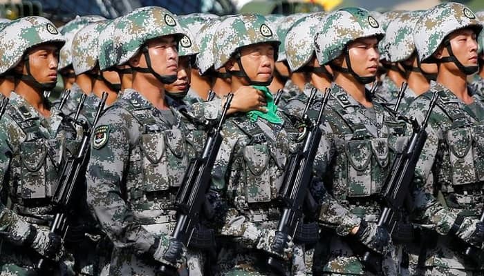 Massive military parade for Xi Jinping as Hong Kong activists freed