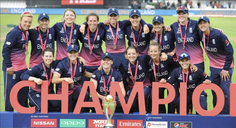 England players pose with the trophy