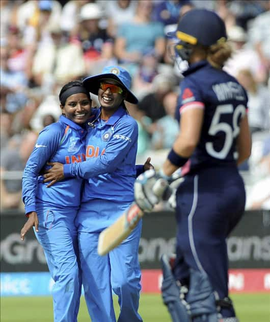 India's Rajeshwari Gayakwad is congratulated by a teammate