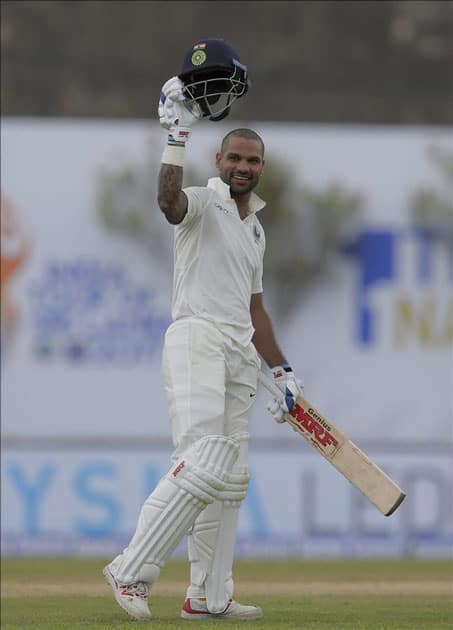 Shikhar Dhawan celebrates scoring a century