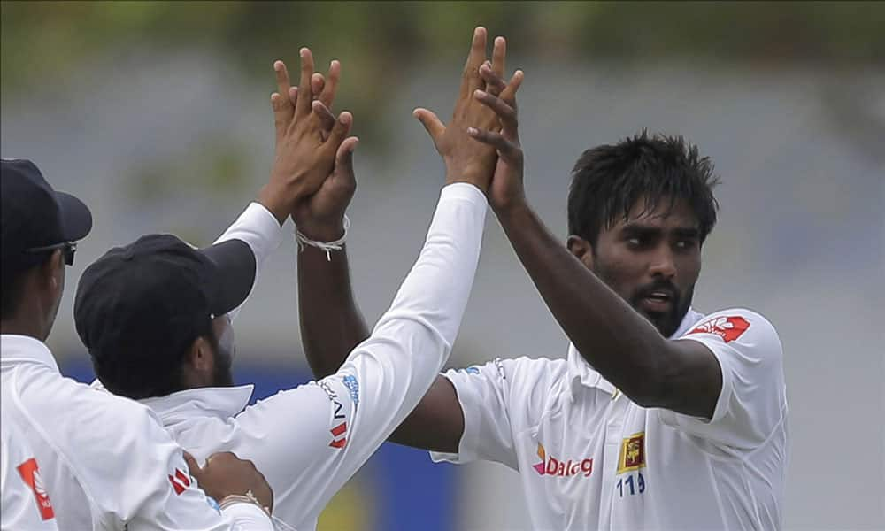 Nuwan Pradeep celebrates after taking the wicket