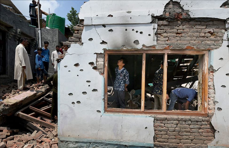 House which was destroyed during a gunbattle between security forces and militants