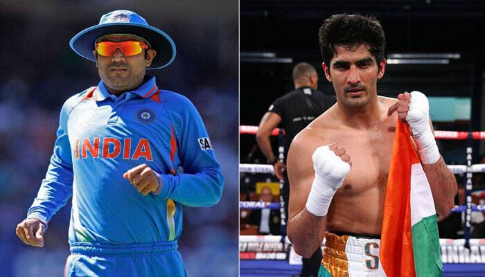 Virender Sehwag enjoys &#039;Hakka Noodles&#039; as Vijender Singh defeats Zulpikar Maimaitiali