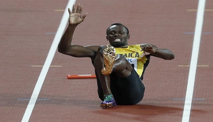 Usain Bolt fails to strike in his final race, goes down with cramp in 4×100m relay