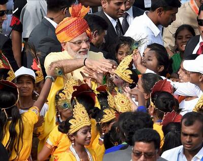 Prime Minister Narendra Modi interacts with children