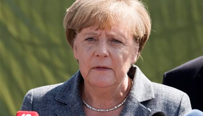 Angela Merkel&#039;s Bavarian ally drops demand for refugee quota