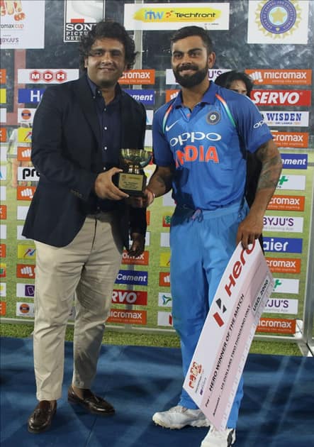 skipper Virat Kohli with the trophy after winning the first ODI