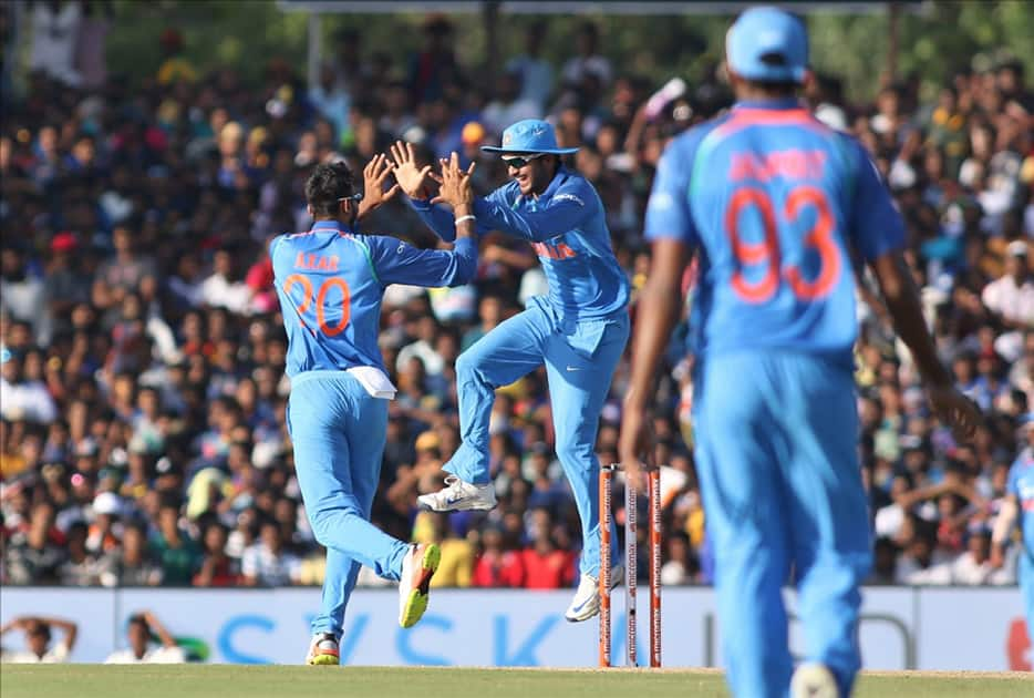 India's Akshar Patel celebrates fall of Wanidu Hasaranga' wicket