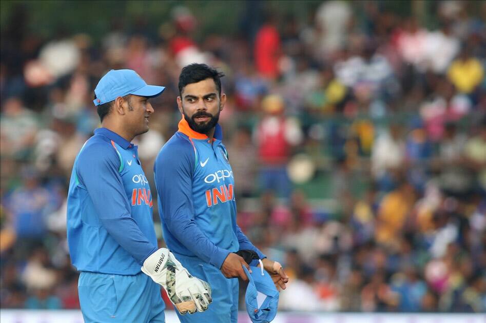 Indian skipper Virat Kohli and MS Dhoni during the first ODI