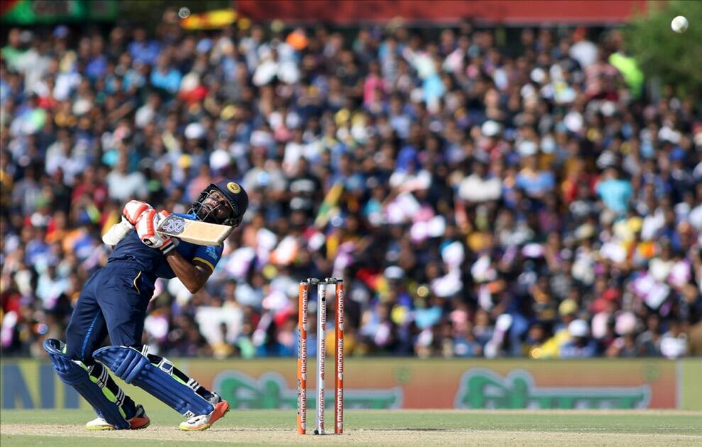 Niroshan Dickwella in action during the first ODI