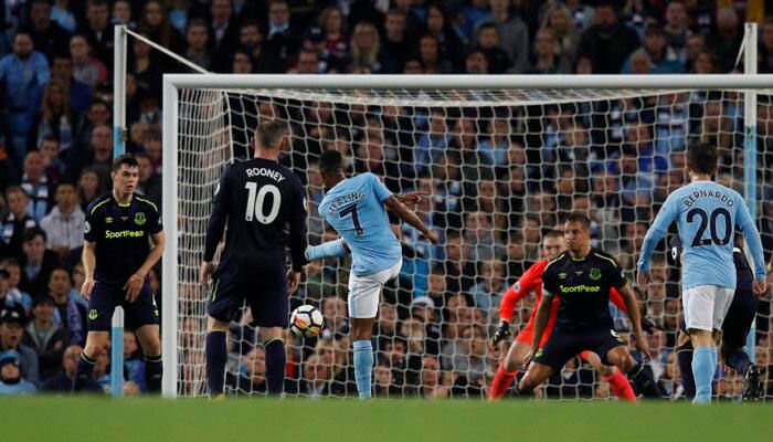 Raheem Sterling rescues 10-man Man City against Everton as Wayne Rooney nets 200th EPL goal 