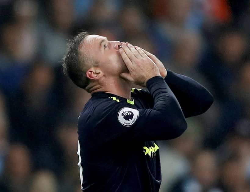 Wayne Rooney celebrates his goal against Manchester City