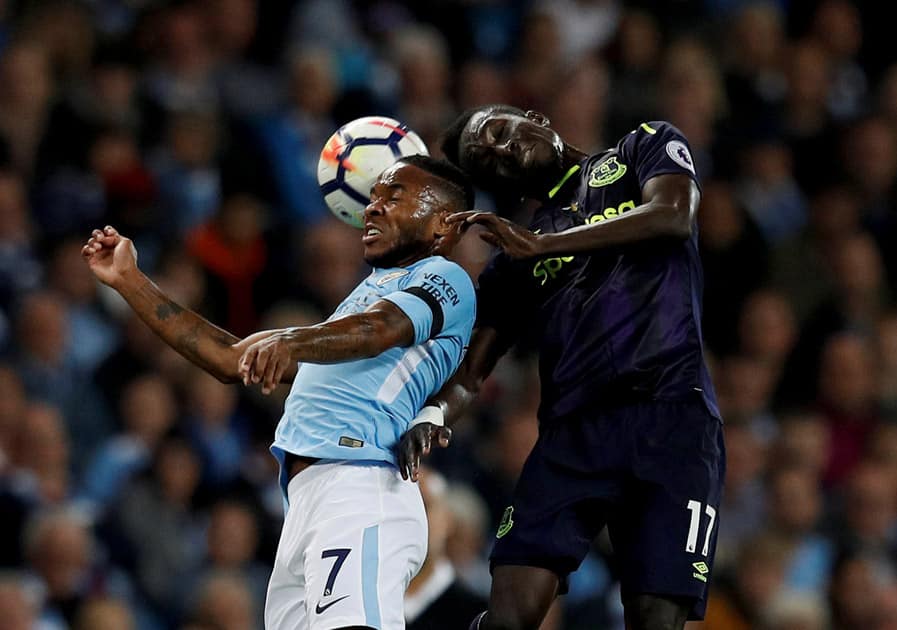 Manchester City's Raheem Sterline vies for the ball against Everton's Idrissa Gueye