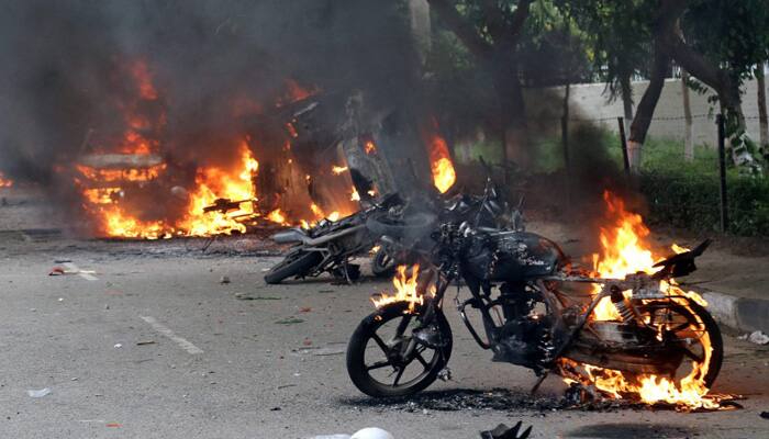 Massive violence after Dera chief&#039;s conviction, Dera supporters go on rampage: In Pics