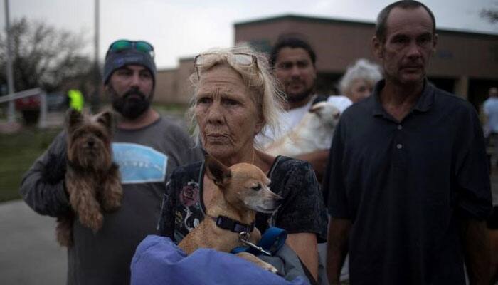 An unlikely hurricane hero takes over chaotic Texas storm shelter