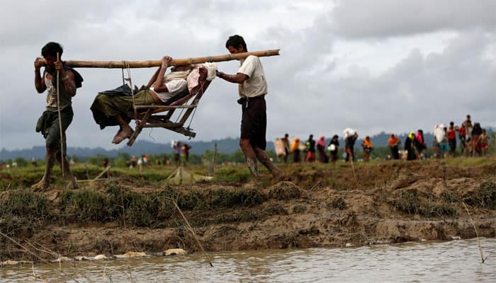 Food aid suspended as Myanmar state sinks deeper into violence