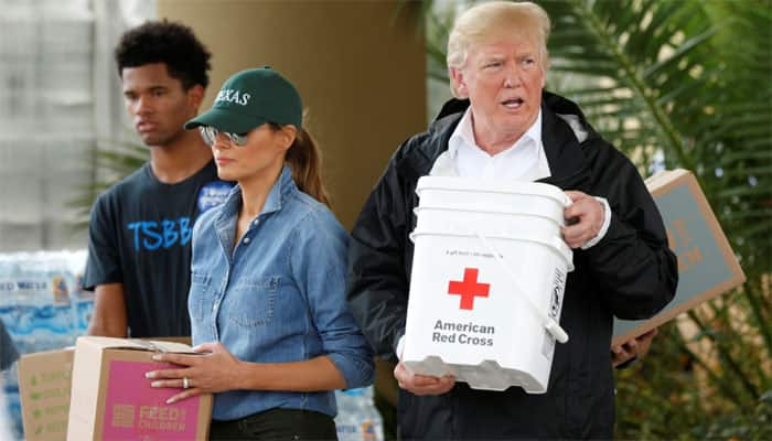 Donald Trump hugs Harvey&#039;s victims in test of presidential mien