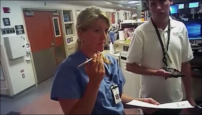 Watch video: Nurse forcibly arrested by US cop after she refuses to draw patient&#039;s blood