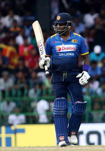 Sri Lanka's Angelo Mathews celebrates his half century Sri Lanka's Angelo Mathews celebrates his half century