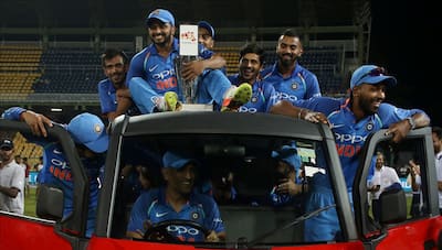Indian cricketer MS Dhoni driving a vehicle