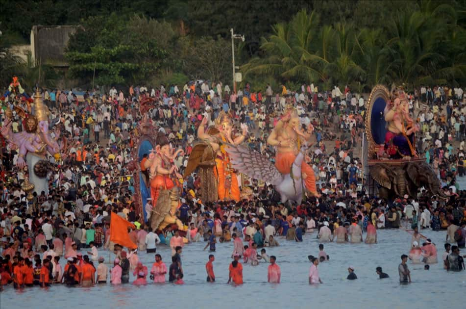 Ganesh immersion underway at Girgaum sea beach in Mumbai.