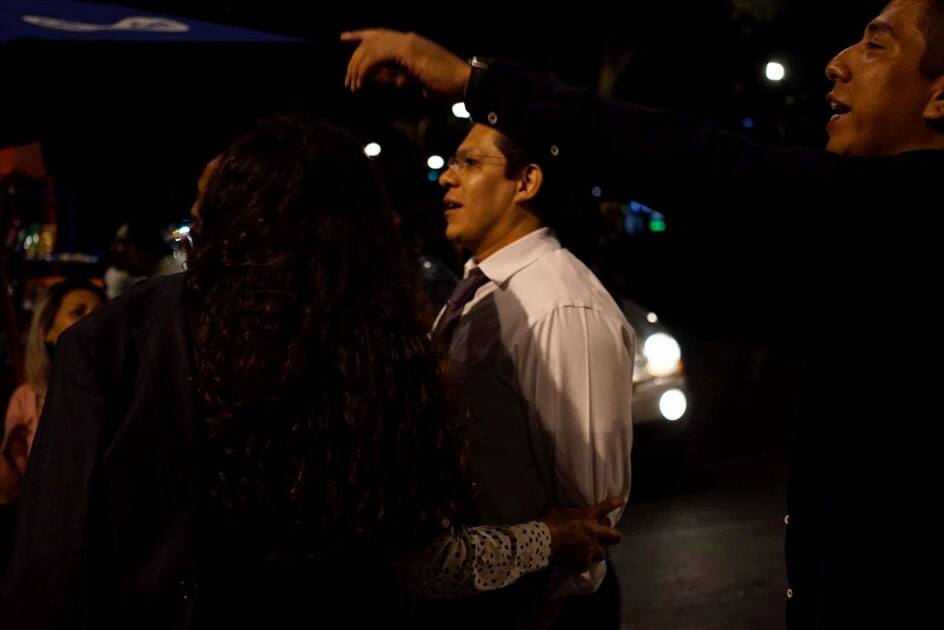 People react on a street after an earthquake jolted Mexico City, capital of Mexico