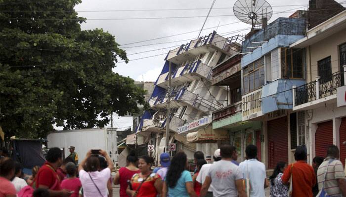 Deadly quake, hurricane a one-two punch for Mexico; 66 die