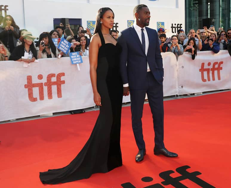 Actor Idris Elba arrives with his girlfriend Sabrina Dhowre at the premiere of the film 