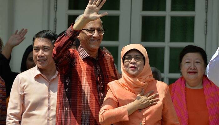 Singapore gets its first woman President