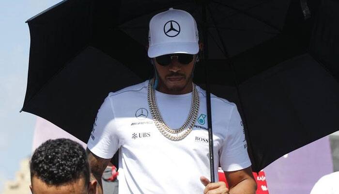 Lewis Hamilton chasing Singapore GP hat-trick but wary of Ferrari