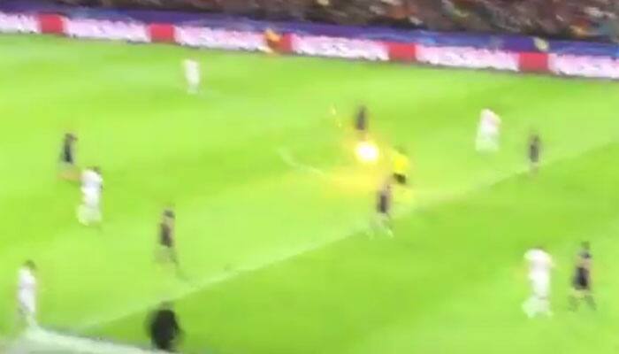 Watch: Referee narrowly escapes burning flare during Champions League match