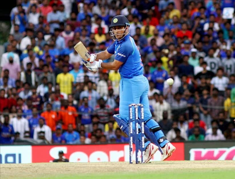 MS Dhoni in action during the first ODI cricket match between India and Australia