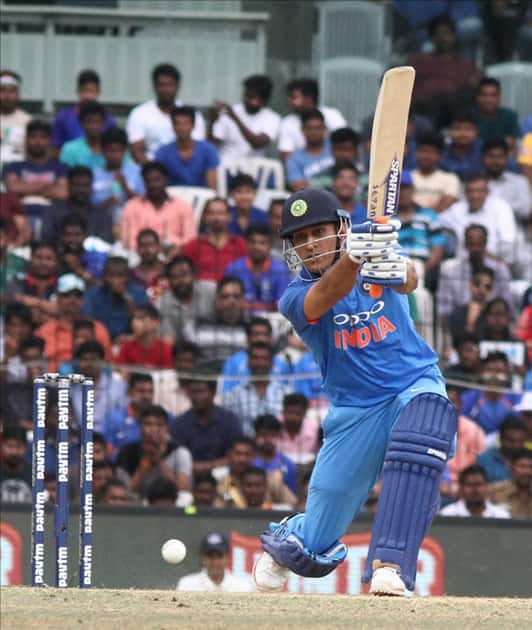 MS Dhoni in action during the first ODI cricket match between India and Australia at MA Chidambaram Stadium