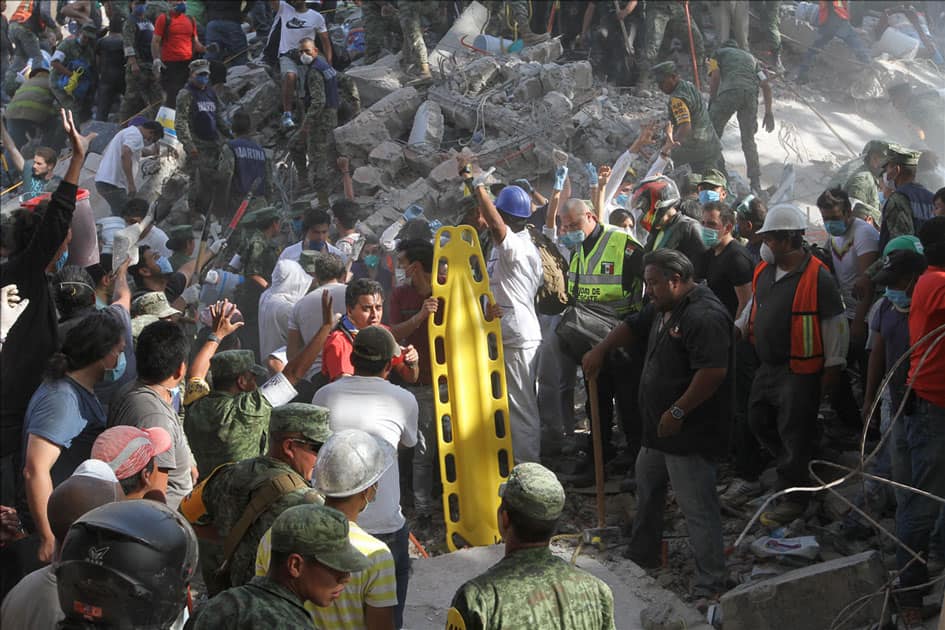 Rescuers and volunteers work after an earthquake in Mexico City, capital of Mexico