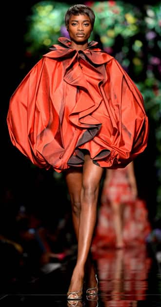 A model displays a creation from the Moschino Spring/Summer 2018 show at the Milan Fashion Week in Milan