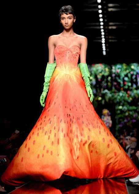 A model displays a creation from the Moschino Spring/Summer 2018 show at the Milan Fashion Week in Milan.