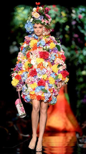 A model displays a creation from the Moschino Spring/Summer 2018 show at the Milan Fashion Week in Milan.