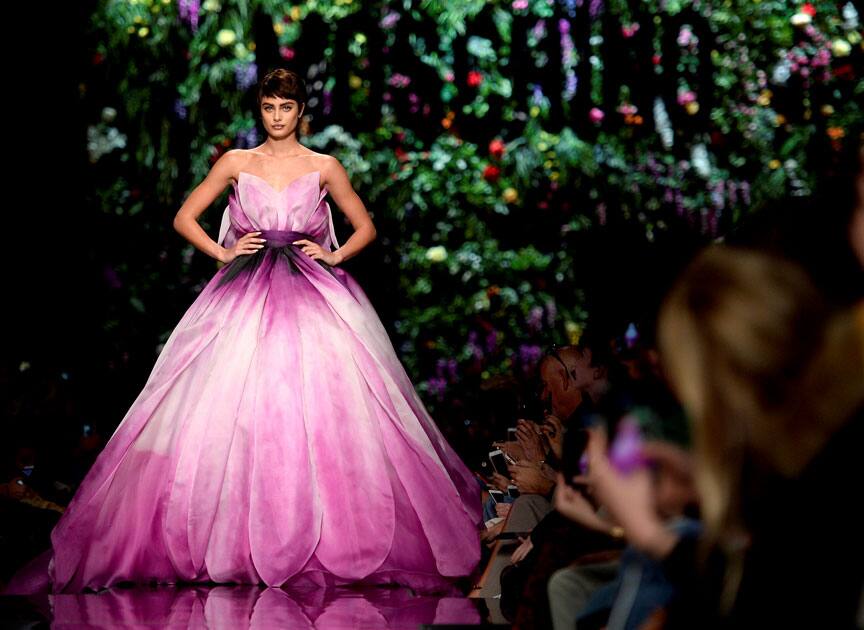 A model displays a creation from the Moschino Spring/Summer 2018 show at the Milan Fashion Week in Milan.