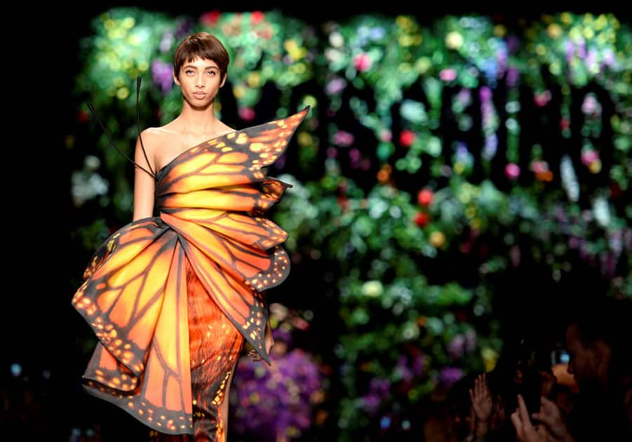 A model displays a creation from the Moschino Spring/Summer 2018 show at the Milan Fashion Week in Milan.