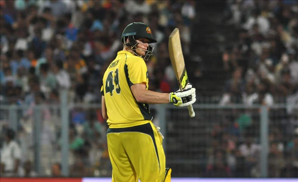 Australian skipper Steve Smith celebrates his half century during the second ODI cricket match between India and Australia at Eden Gardens in Kolkata. Australian skipper Steve Smith celebrates his half century during the second ODI cricket match between India and Australia at Eden Gardens in Kolkata.