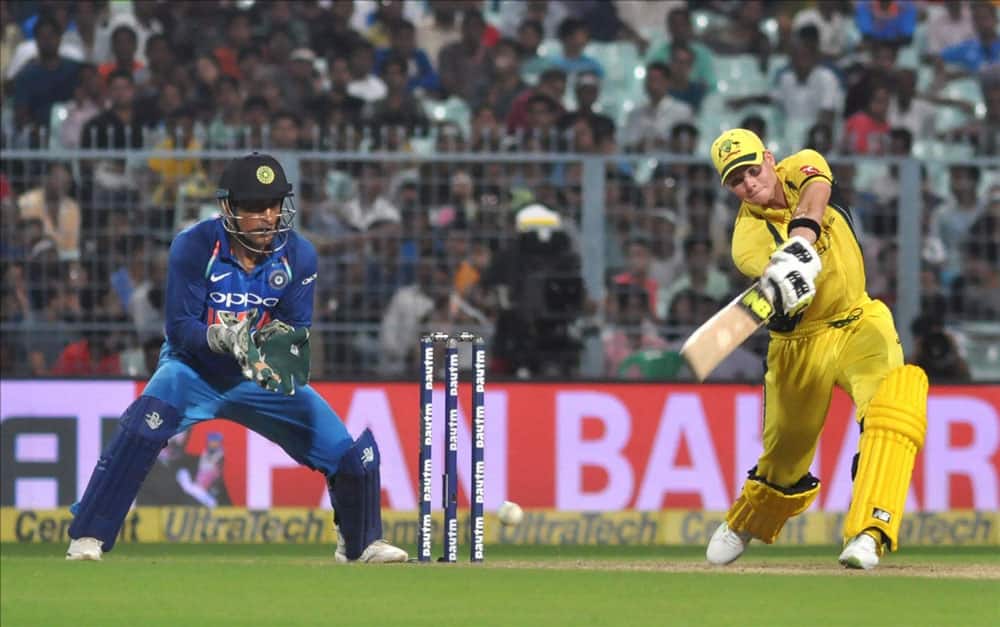 Australian skipper Steve Smith celebrates his half century during the second ODI cricket match between India and Australia at Eden Gardens in Kolkata. Australian skipper Steve Smith celebrates his half century during the second ODI cricket match between India and Australia at Eden Gardens in Kolkata.