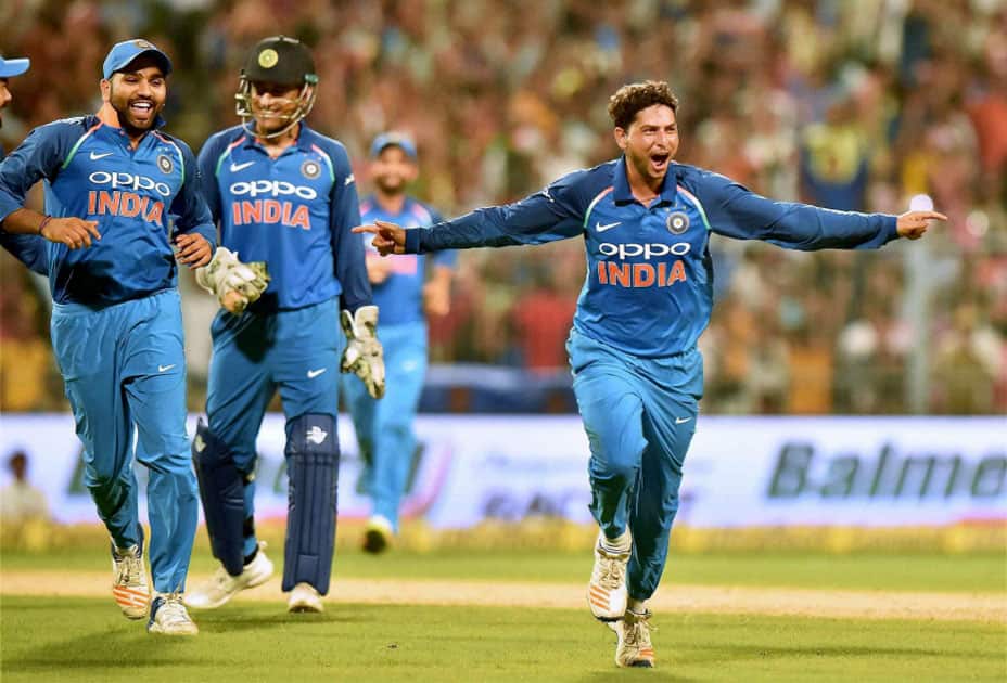 India's bowler Kuldeep Yadav celebrates his hat trick against Australia during 2nd ODI cricket match at Eden Garden in Kolkata. India's bowler Kuldeep Yadav celebrates his hat trick against Australia during 2nd ODI cricket match at Eden Garden in Kolkata.