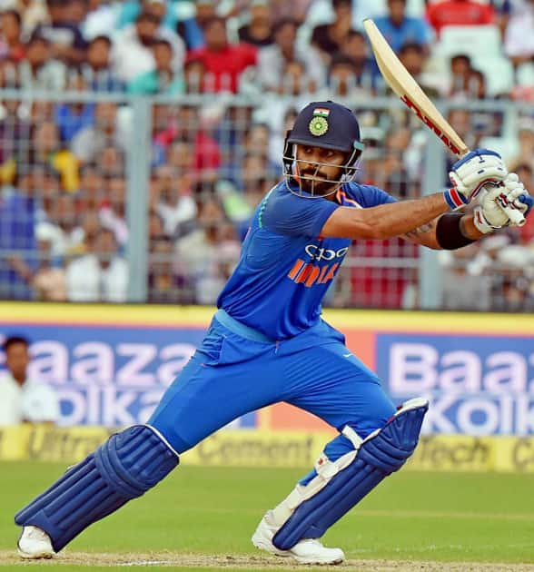 Indian captain Virat Kohli in action during the 2nd ODI cricket match against Australia at Eden Garden in Kolkata. Indian captain Virat Kohli in action during the 2nd ODI cricket match against Australia at Eden Garden in Kolkata.