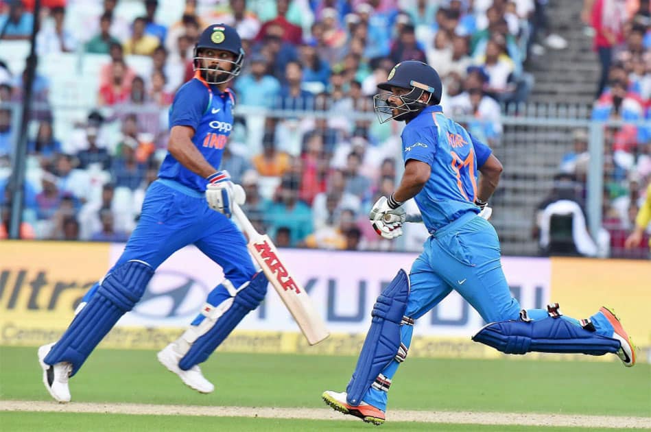Indian captain Virat Kohli and Kedar Jadhav take a run during the 2nd ODI cricket match against Australia at Eden Garden in Kolkata Indian captain Virat Kohli and Kedar Jadhav take a run during the 2nd ODI cricket match against Australia at Eden Garden in Kolkata
