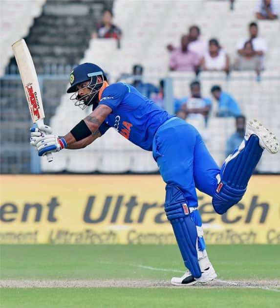 Indian captain Virat Kohli in action during the 2nd ODI cricket match against Australia at Eden Garden in Kolkata. Indian captain Virat Kohli in action during the 2nd ODI cricket match against Australia at Eden Garden in Kolkata.