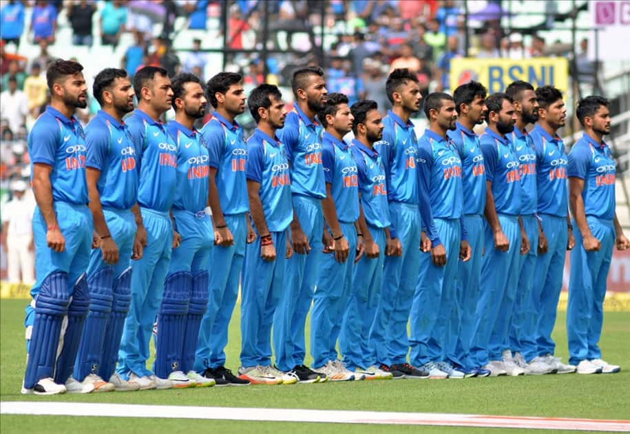 Indian players stand during the national anthem ahead of the second ODI cricket match between India and Australia at Eden Gardens in Kolkata. Indian players stand during the national anthem ahead of the second ODI cricket match between India and Australia at Eden Gardens in Kolkata.