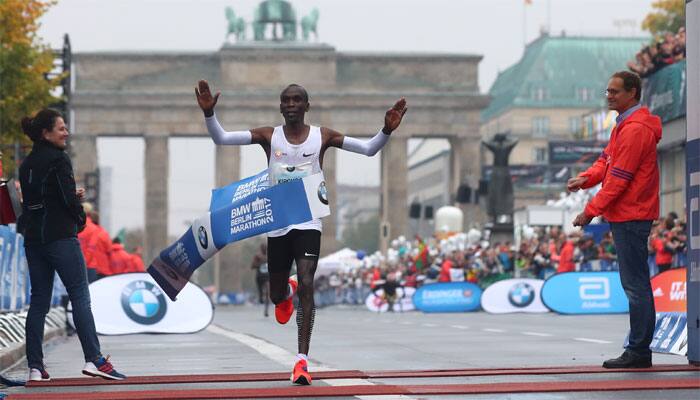 Eliud Kipchoge wins rainy Berlin marathon, misses world record | Other ...