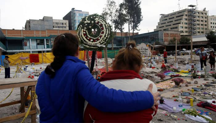 Mexicans turn to church as earthquake death toll hits 320